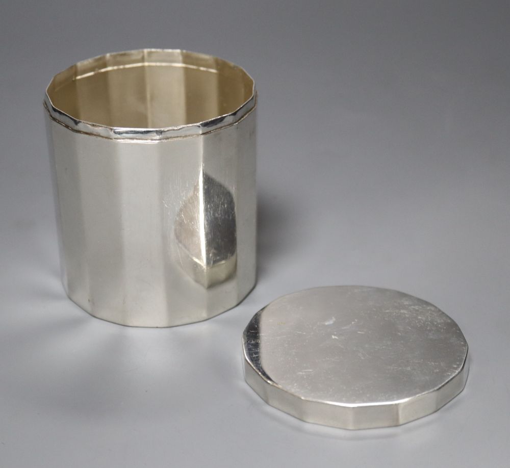 A late George II silver panelled canister and cover, MR, London, 1759, 8cm, 5oz.